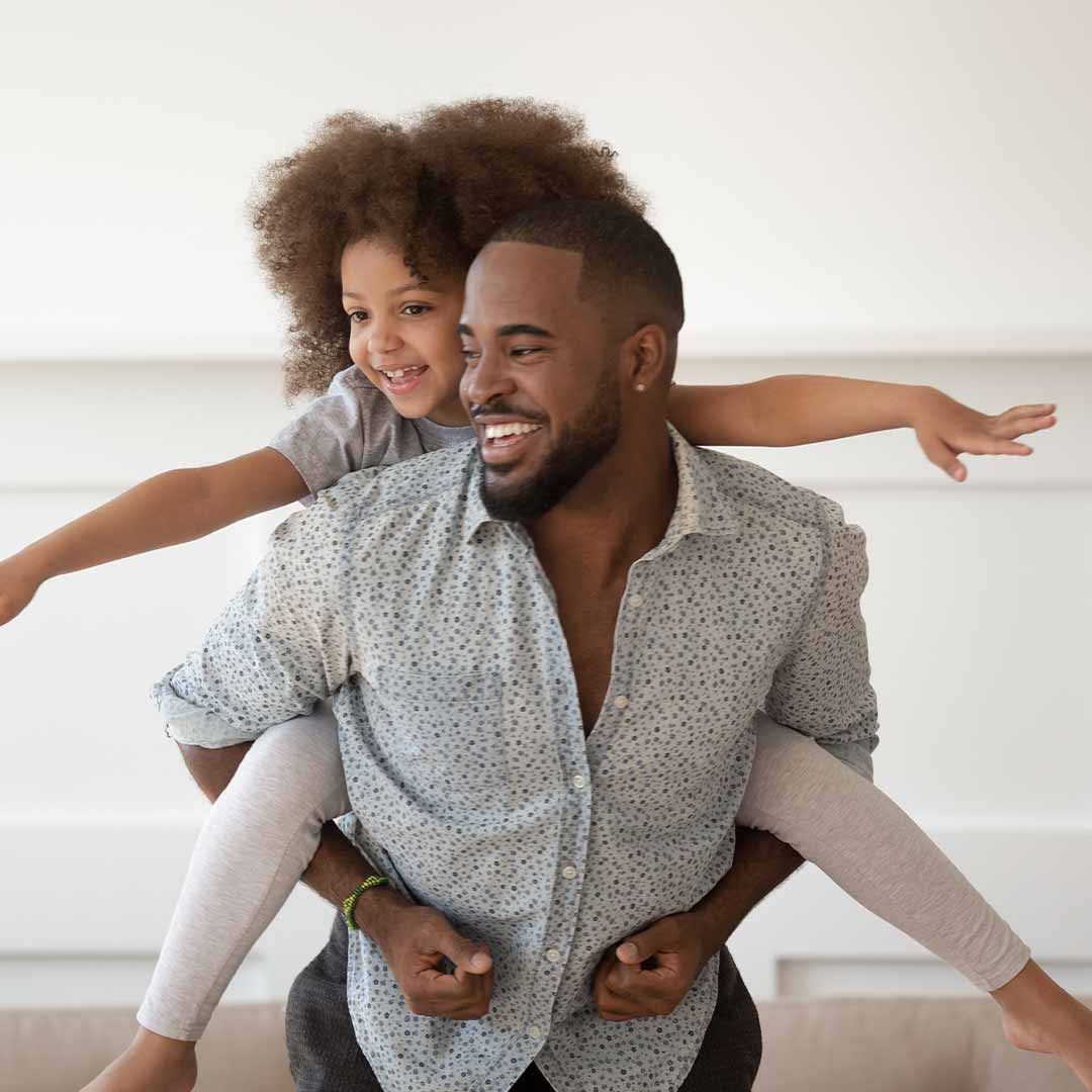 dad and daughter playing