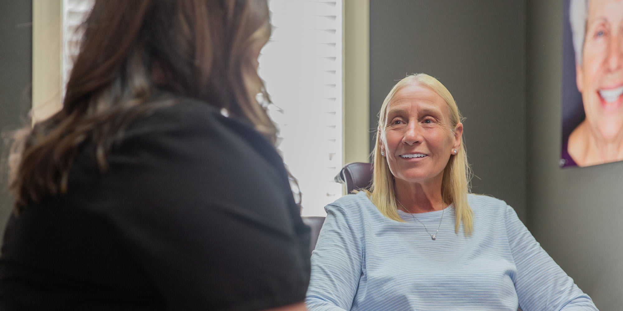 staff talking to patient